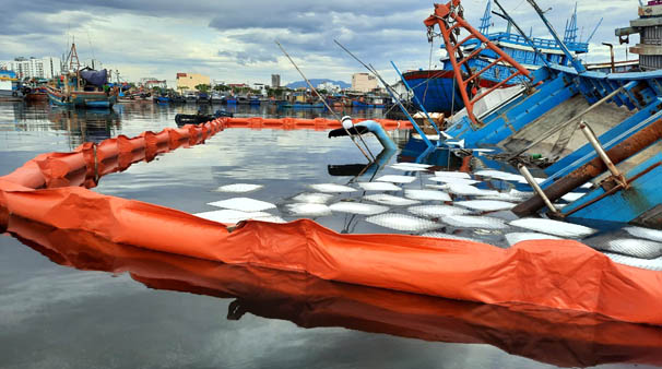 A picture containing boat, water, outdoor, orangeDescription automatically generated