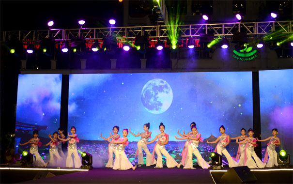 A group of women dancing on a stageDescription automatically generated