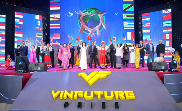 A group of people on a stageDescription automatically generated