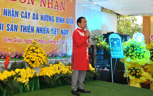 A picture containing text, standing, yellowDescription automatically generated