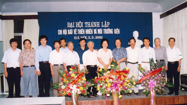 A group of people posing for a photoDescription automatically generated