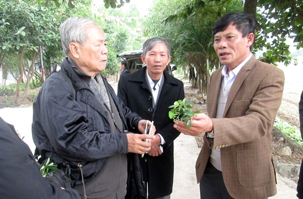 A group of men standing outsideDescription automatically generated with low confidence