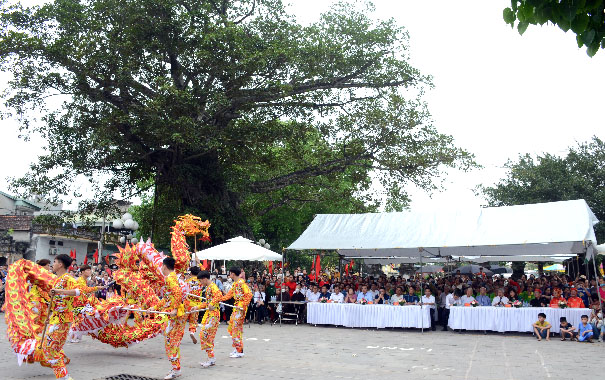 A picture containing outdoor, tree, dance, paradeDescription automatically generated
