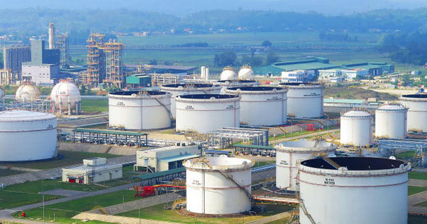 A picture containing cylinder, building, storage tank, siloDescription automatically generated