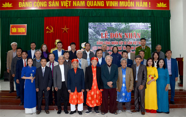 A group of people posing for a photoDescription automatically generated