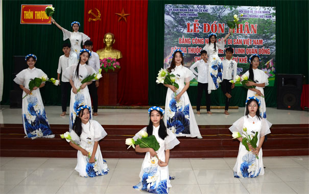 A group of people in white dressesDescription automatically generated