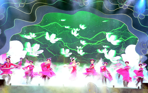 A group of women dancing on a stageDescription automatically generated