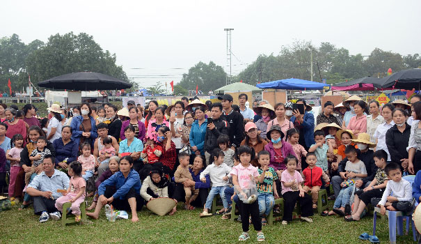 A large group of people posing for a photoDescription automatically generated