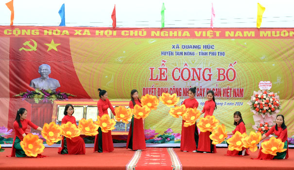 A group of women performing on a stageDescription automatically generated