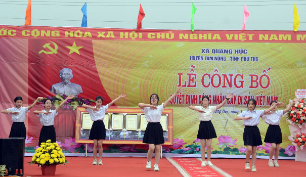A group of girls performing on a stageDescription automatically generated