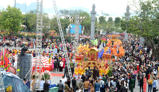 A large crowd of people in a paradeDescription automatically generated