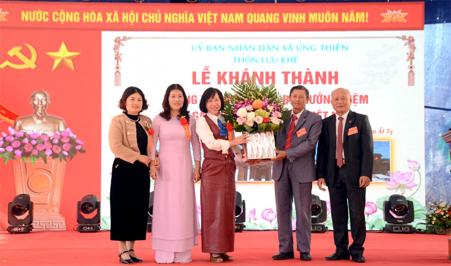 A group of people posing for a photoAI-generated content may be incorrect.