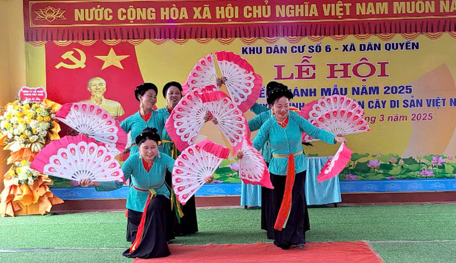 A group of women dancing on a stageAI-generated content may be incorrect.