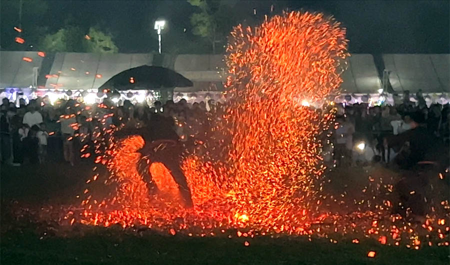 A person throwing fire in the airAI-generated content may be incorrect.