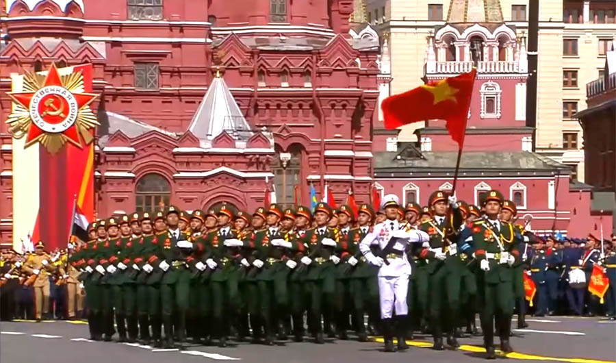 A group of people marching in a paradeAI-generated content may be incorrect.