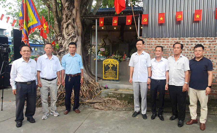 A group of men standing in front of a buildingAI-generated content may be incorrect.